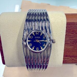 Guess watch upgraded to a unique silver tone bracelet band new battery
